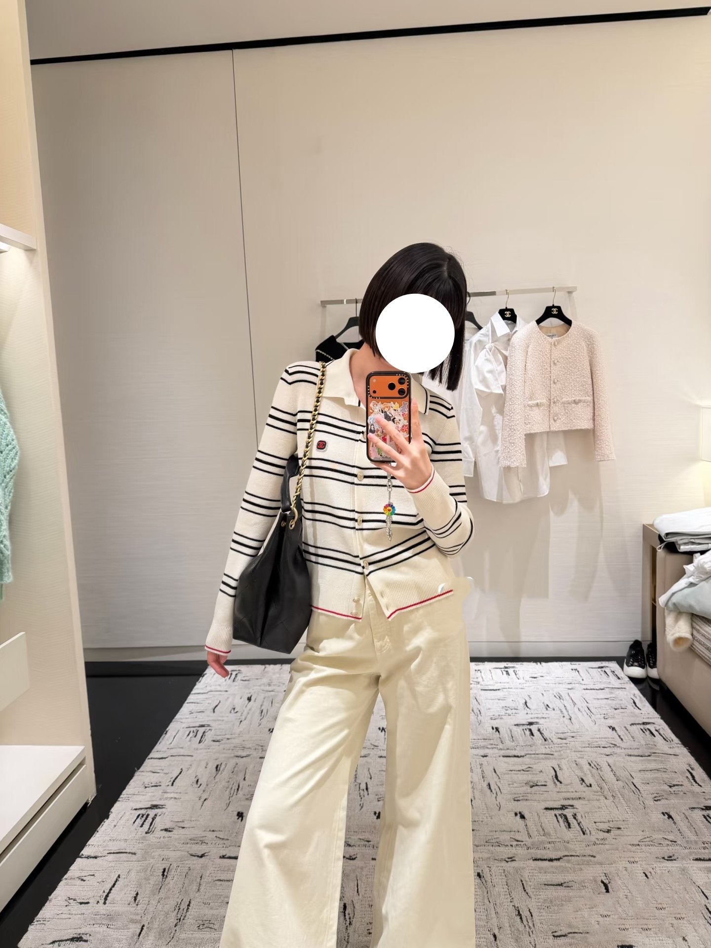 Chanel's striped button-down knitted cardigan W6022705